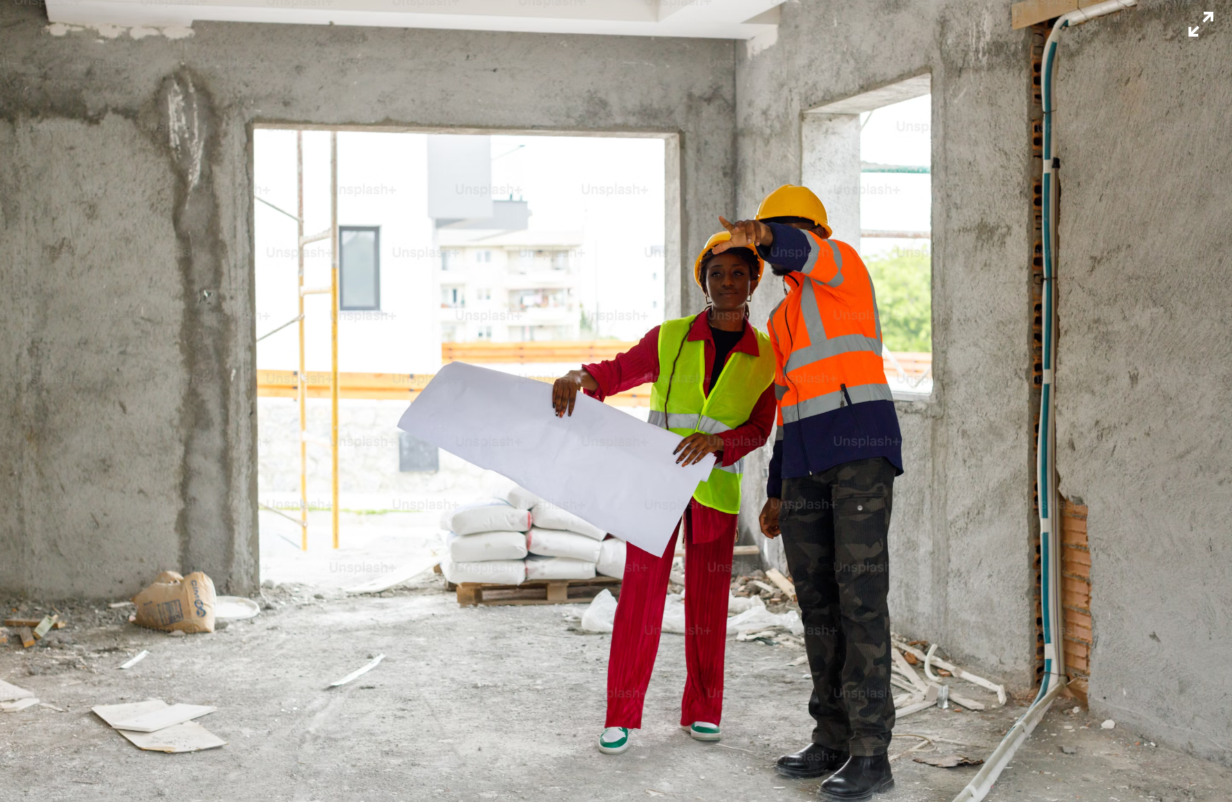 Construction team planning at a building site